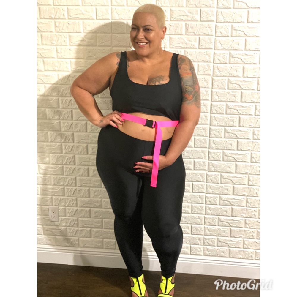 Body suit with hot pink attached belt